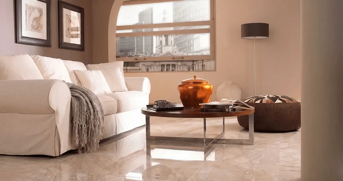 Modern living room with professionally installed marble flooring, a beige sofa, coffee table in Seattle, WA